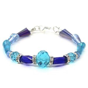 Bracelet with light blue and dark blue crystals, Rhinestones, lobster clasp.